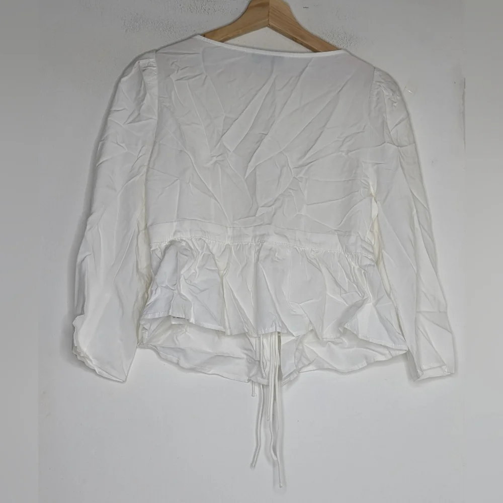 Anthropologie En Saison Azra Puff-Sleeve Peplum Top size small
